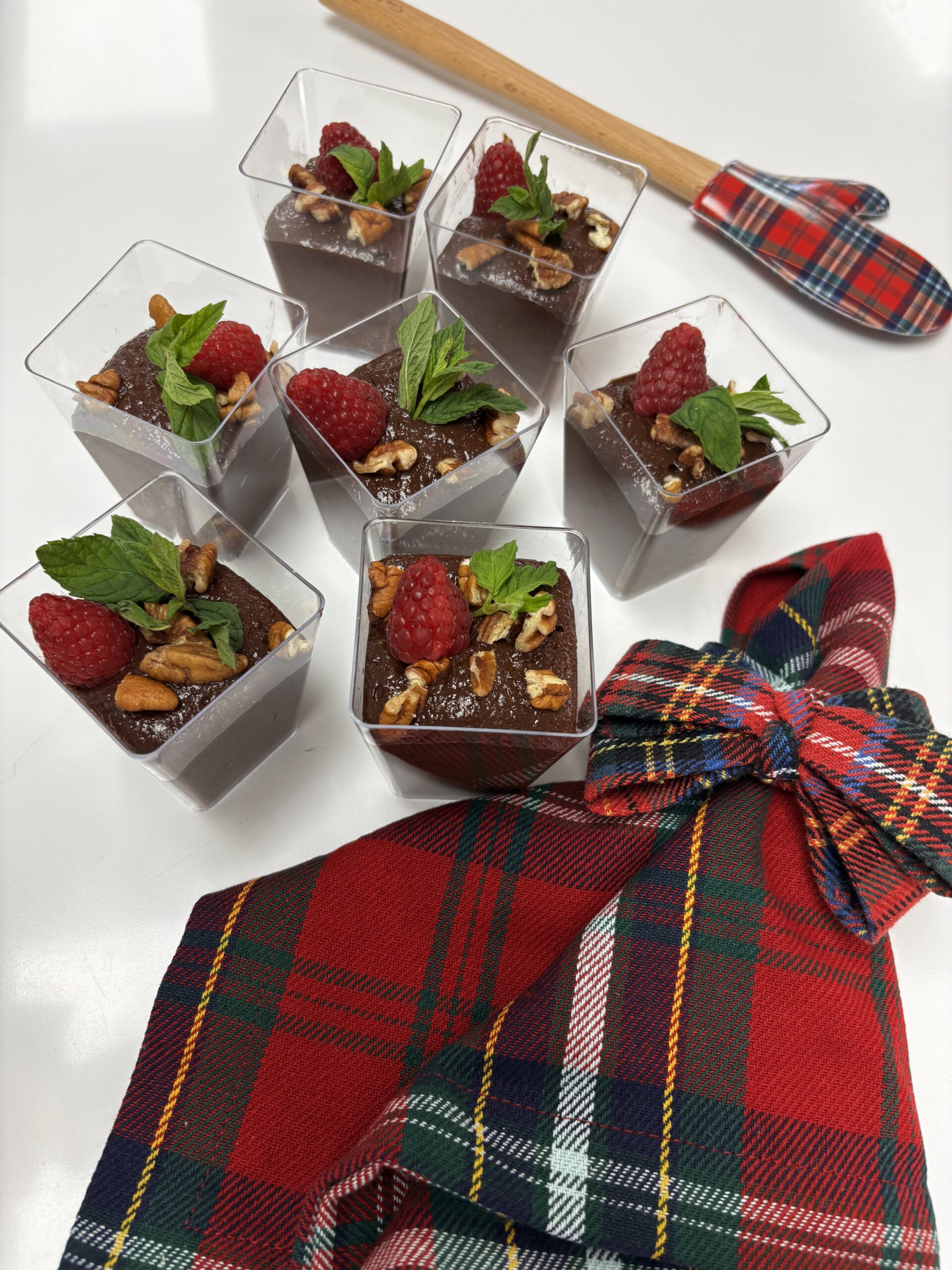 Chocolate desserts with raspberries and mint.| ANA MARIA'S CATERING