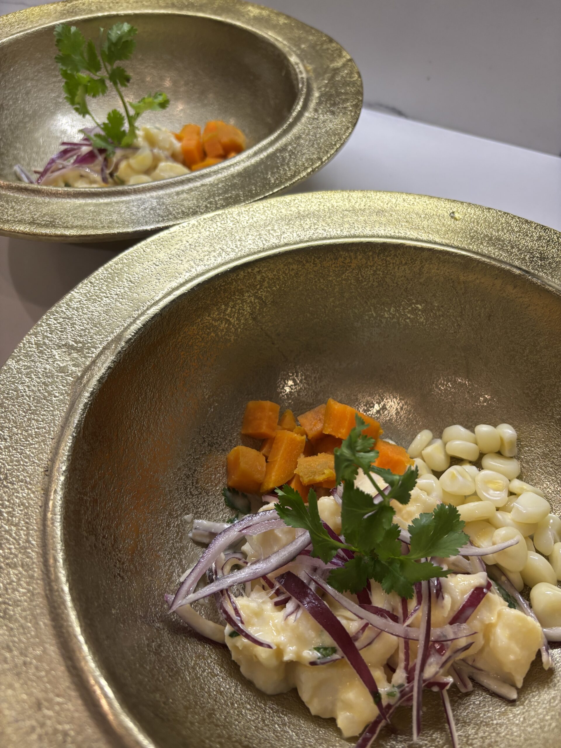 Peruvian ceviche in gold bowls.| ANA MARIA'S CATERING
