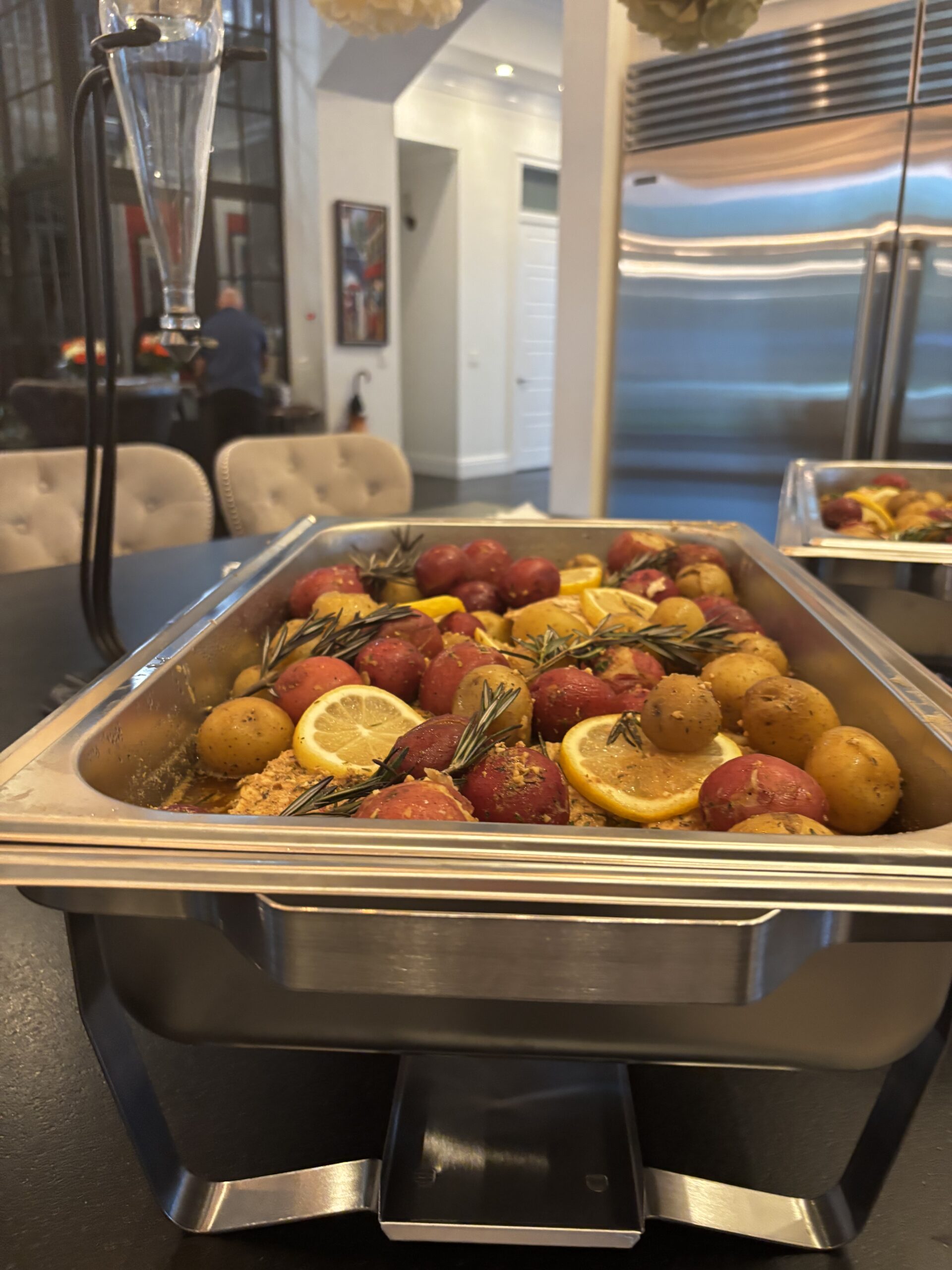 Roasted potatoes, lemon, and rosemary.| ANA MARIA'S CATERING