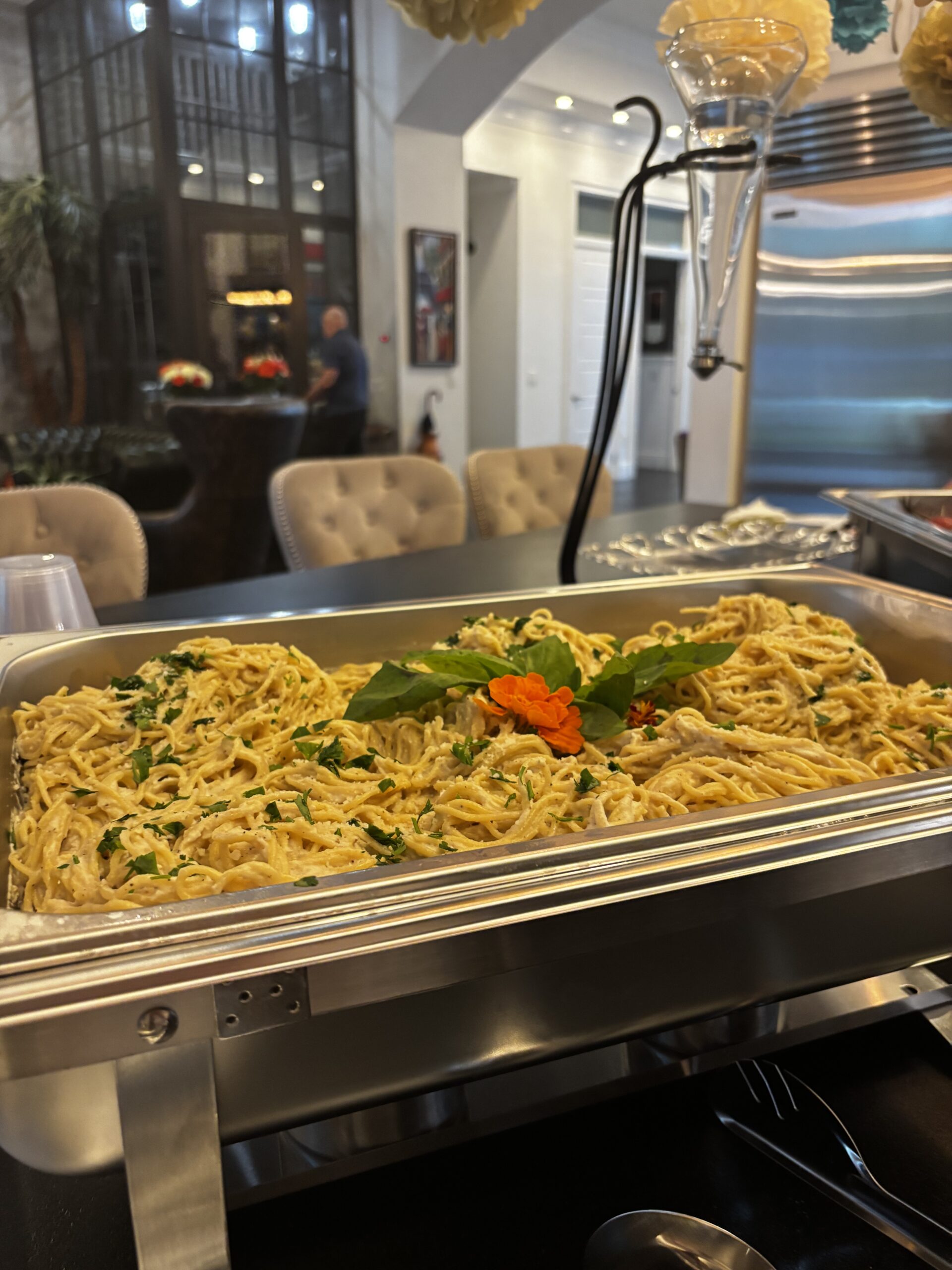Pasta in chafing dish at a buffet | ANA MARIA'S CATERING